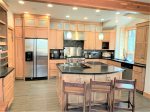Create memorable meals in this Custom designed Chef Kitchen with quartz counters and just about anything you will need